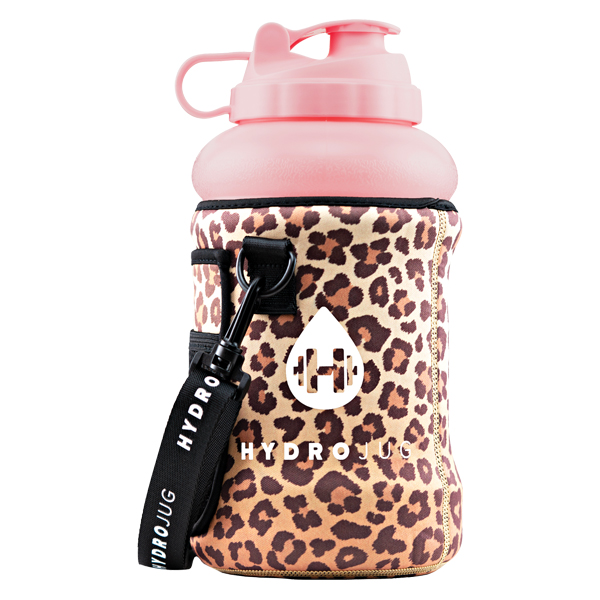 A woman in a leopard print dress drinking from a water bottle